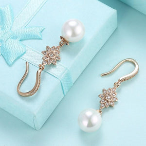 Swarovski Crystal Star Shaped Dangling Classic Pearl Dangling Earrings Set in 18K Gold